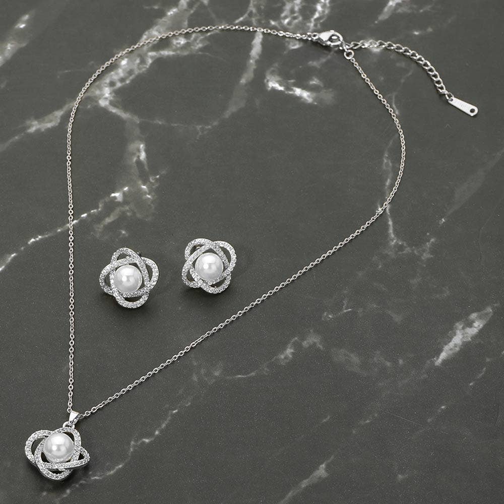 Stainless Steel Pearl Accent Stone Pave Flower Pendant Necklace: Rhodium