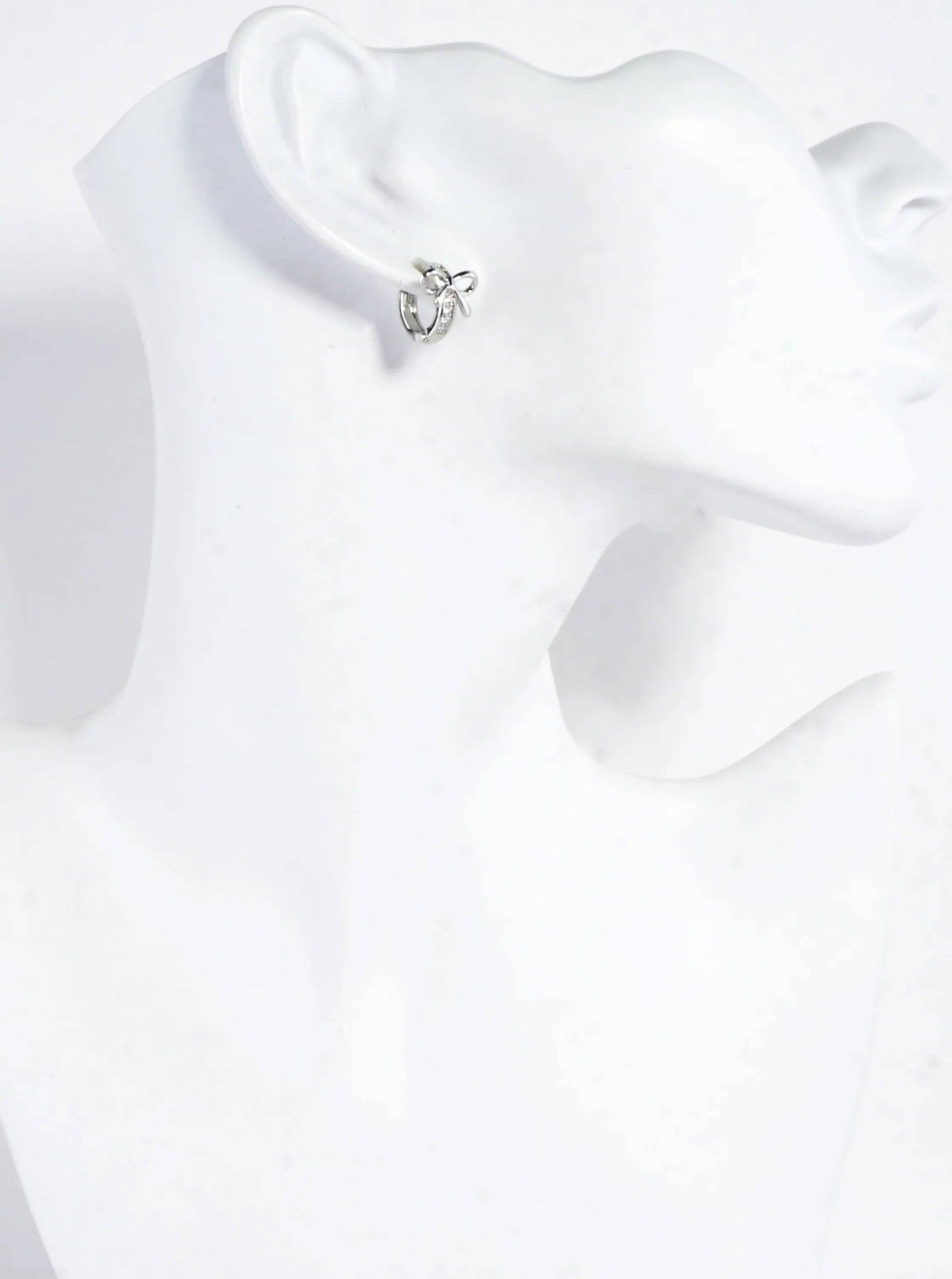 CZ Pave Polished Ribbon Bow Huggie Hoop Earrings: Rhodium Clear