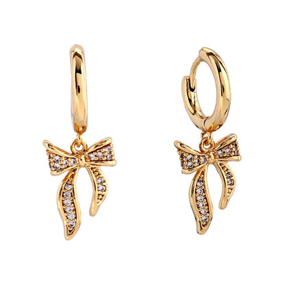 Gold Dipped CZ Stone Paved Boutique Ribbon Huggie Earrings: Gold