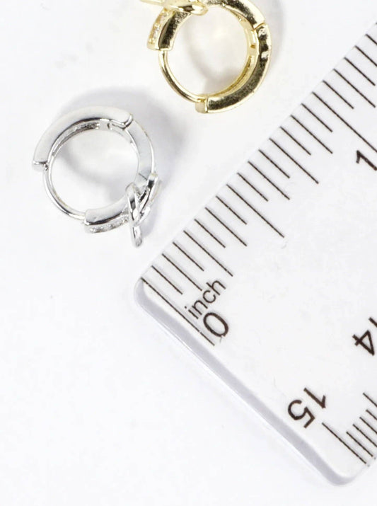 CZ Pave Polished Ribbon Bow Huggie Hoop Earrings: Rhodium Clear