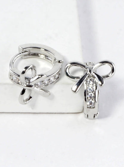 CZ Pave Polished Ribbon Bow Huggie Hoop Earrings: Rhodium Clear