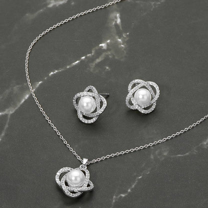 Stainless Steel Pearl Accent Stone Pave Flower Pendant Necklace: Rhodium