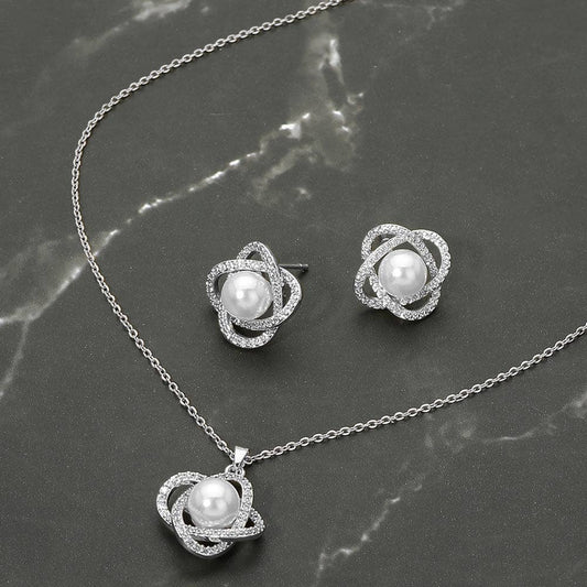 Stainless Steel Pearl Accent Stone Pave Flower Pendant Necklace: Rhodium
